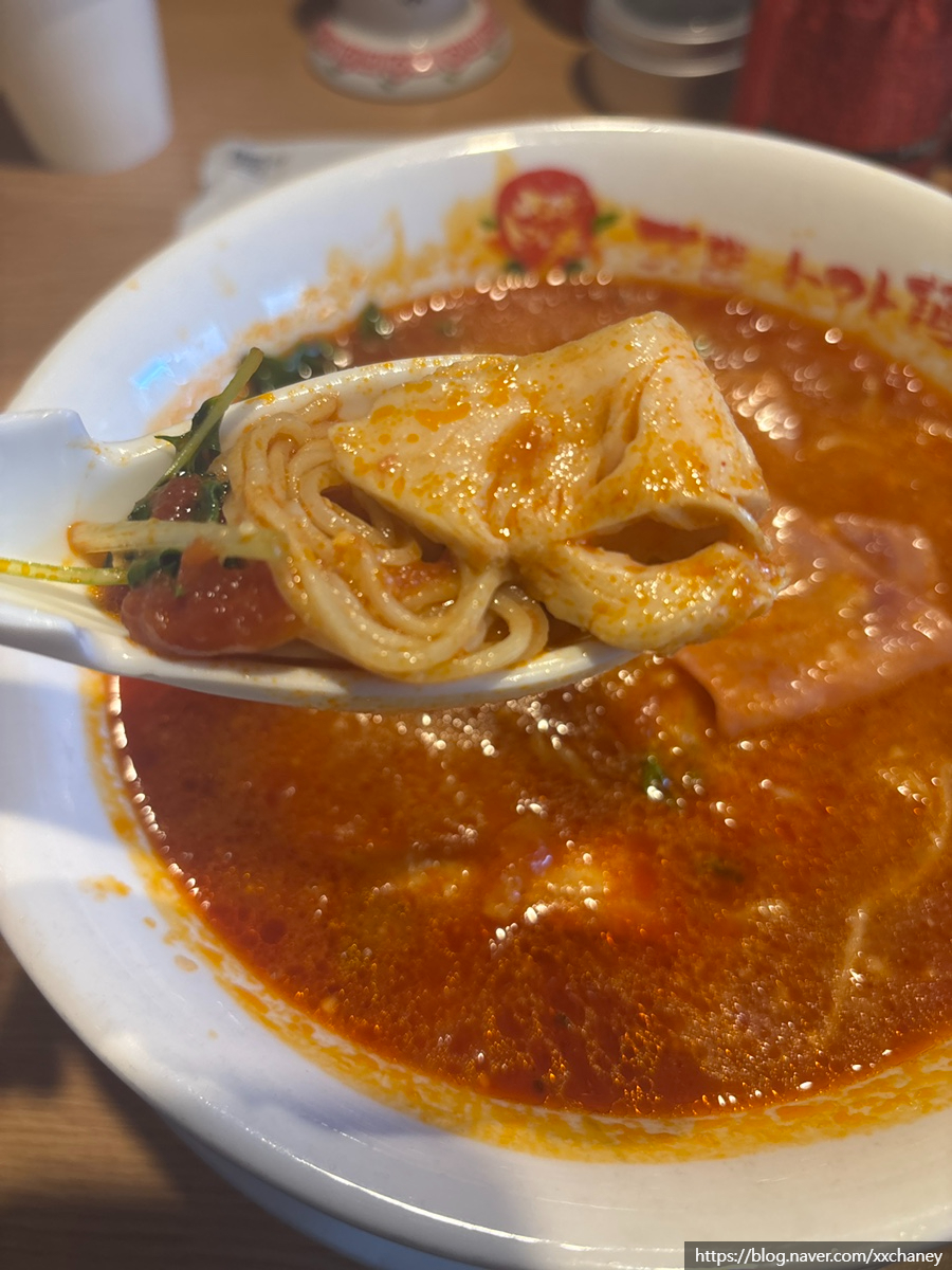 Tomato ramen noodles close-up