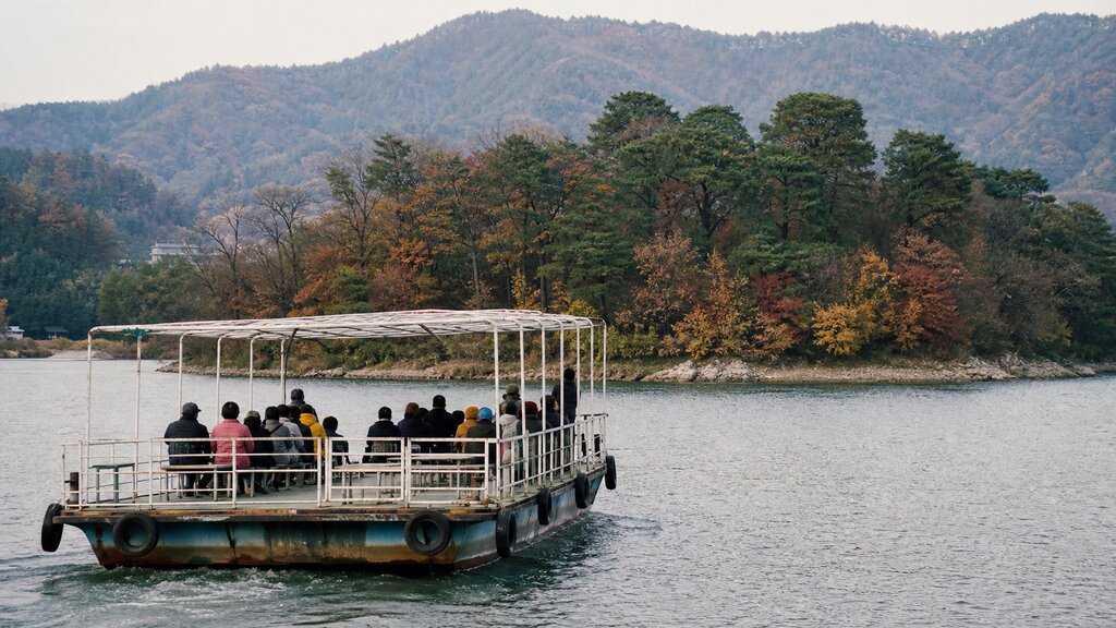 The passenger ferry crossing the Han River from Gapyeong wharf toward the wooded shore of Nami Island